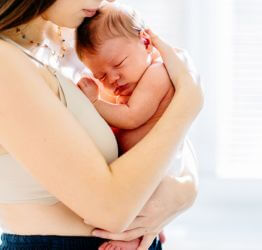 Mom holding an infant